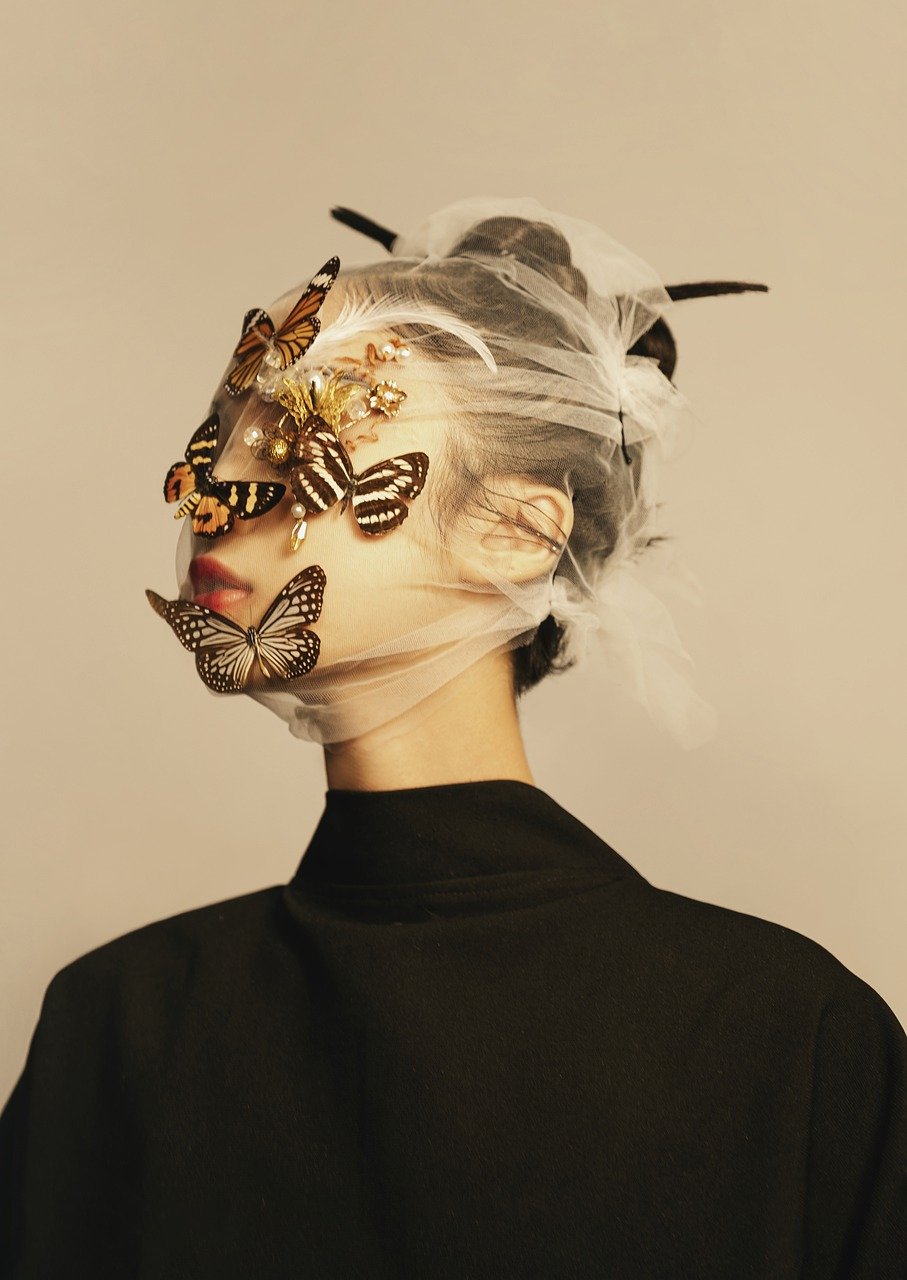 woman, butterflies, fashion-6588614.jpg